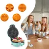 Two children making waffles in a kitchen. Náhled obrázku produktu