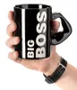 A hand wearing a watch holds a black mug with "BIG BOSS" written on it in white letters. Anteprima dell’immagine prodotto