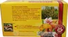 The back of a yellow tea box with German text and images of fruit and an orchard. Voir les images du produit
