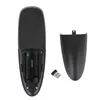 The back of a black remote control is shown, with the battery compartment open, revealing two batteries and a USB receiver. Produktbild-Vorschau