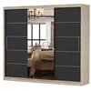 A wardrobe with mirrored doors reflecting a bedroom interior. Produktbild-Vorschau
