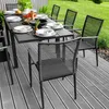 An outdoor dining set on a wooden deck with a lawn in the background. Náhled obrázku produktu