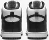 A back view of two Nike Dunk High sneakers in black and white. Náhled obrázku produktu