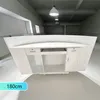 A white reception desk in a large, empty room. Anteprima dell’immagine prodotto