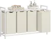 A white laundry sorter with four beige fabric bins and a top shelf holding folded towels and soap dispensers. Náhled obrázku produktu