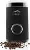 A black electric coffee grinder with a clear lid, placed in front of a white background. A pile of coffee beans is scattered in front of the grinder. Náhled obrázku produktu