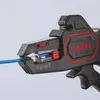 A close-up shot of a wire stripper tool in use, with a blue and copper wire inserted. Produktbild-Vorschau