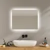 A modern bathroom vanity with a lit mirror, sink, and wooden countertop. Anteprima dell’immagine prodotto