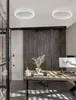 A modern office space with a wooden desk, chair, and computer. Produktbild-Vorschau