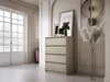 A modern room with a chest of drawers, a large window, and decorative elements. Náhled obrázku produktu