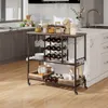 A kitchen scene with a bar cart filled with wine bottles, glasses, and other kitchen items. Podgląd zdjęcia produktu