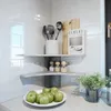 A kitchen corner with shelves displaying kitchenware and food items. Náhled obrázku produktu