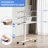 A white C-shaped adjustable height table with a laptop on it, shown in different height positions and with close-ups of the height adjustment mechanism. Produktbild-Vorschau