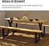 A wooden dining set with black metal legs, placed on a tiled outdoor patio. Anteprima dell’immagine prodotto
