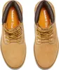 A top-down view of two tan Timberland boots. Náhled obrázku produktu