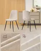 Two beige upholstered chairs with black metal legs are shown in a room with wooden walls and a grey cabinet in the background. Close-up views of the fabric texture and a cleaning icon are also included. Produktbild-Vorschau