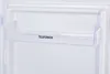 Close-up of an empty refrigerator shelf with the brand name visible. Produktbild-Vorschau