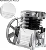 Close-up view of an air compressor head and pulley system. Náhľad obrázku produktu