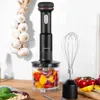 A kitchen scene with a hand blender set, vegetables, and garlic. Produktbild-Vorschau