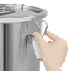 A hand is shown closing the latch on a stainless steel container. Produktbild-Vorschau