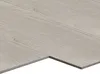 A close-up view of light gray vinyl flooring planks with a wood grain texture. Náhľad obrázku produktu