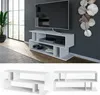 A modern living room setup with a white TV stand and a television. Podgląd zdjęcia produktu
