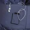 A close-up view of a navy blue bean bag with a small pocket containing a smartphone and earbuds. Produktbild-Vorschau