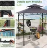 A grill gazebo set up on a patio with a grill, shelves, and accessories. Produktbild-Vorschau
