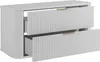 A white bathroom vanity with two drawers, one slightly open, showing gold handles. Náhled obrázku produktu