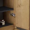 A close-up view of a cabinet hinge and shelf inside a cabinet with a wood grain finish. Produktbild-Vorschau