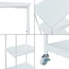Collage of close-up shots of a white rolling printer stand, showing its structure, shelves, and wheels. Voir les images du produit