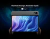 A tablet is held by two hands against a dark, abstract background with blue and green light effects. Produktbild-Vorschau