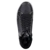 A top-down view of a black Remonte women's boot. Voir les images du produit