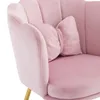 Close-up view of a pink velvet chair with a bow-shaped cushion. Produktbild-Vorschau