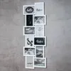 A collage of photo frames mounted on a textured gray wall. Produktbild-Vorschau