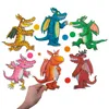 A hand is holding a puzzle piece of a dragon, with other dragon puzzle pieces and colorful circles scattered around on a white background. Produktbild-Vorschau