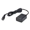 A black dummy battery adapter with a cable and a DC connector, isolated on a white background. Náhled obrázku produktu