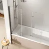 A modern bathroom with a bathtub and a glass shower screen. Produktbild-Vorschau