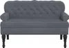 A dark gray velvet loveseat with tufted back and black legs, presented against a white background. Náhled obrázku produktu