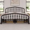 A black metal bed frame with a crown motif headboard is shown in a bedroom setting. Produktbild-Vorschau