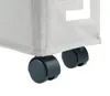 A close-up view of the bottom of a laundry basket with wheels. Anteprima dell’immagine prodotto
