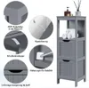 A collage of close-up images highlighting features of a gray bathroom cabinet, with the cabinet itself shown on the right. Produktbild-Vorschau