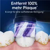 A close-up of an electric toothbrush head cleaning teeth, with marketing text overlay. Anteprima dell’immagine prodotto