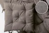 A close-up view of a tufted seat cushion, with a magnified inset showing the fabric texture. Produktbild-Vorschau