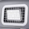 A close-up view of a ventilation grate on a gray pet carrier. Podgląd zdjęcia produktu