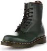 A single green Dr. Martens boot is shown against a white background. Produktbild-Vorschau