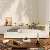 A bedroom scene with a daybed, coffee table, and decor. Anteprima dell’immagine prodotto