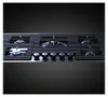 A close-up, studio shot of a gas stovetop. Voir les images du produit