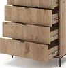 A close-up view of a wooden chest of drawers with five drawers, some of which are partially open. Podgląd zdjęcia produktu