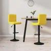 Two yellow bar stools are shown in a dining area with a table. Produktbild-Vorschau